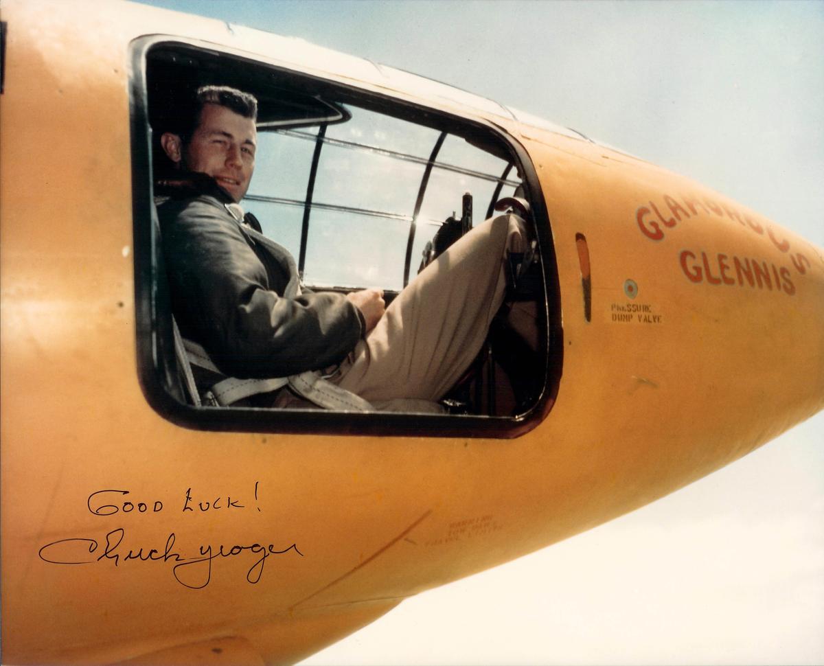Yeager sitting in the Bell X-1 cockpit, from a print signed by Yeager at Edwards Air Force Base (<a href="https://commons.wikimedia.org/wiki/File:Chuck_Yeager_X-1_(color).jpg">Jack Ridley</a>)