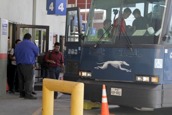 An asylum seeker from Guatemala boards a Greyhound bus in El Paso, Texas, on April 2, 2019. (Cedar Attanasio/AP/File)