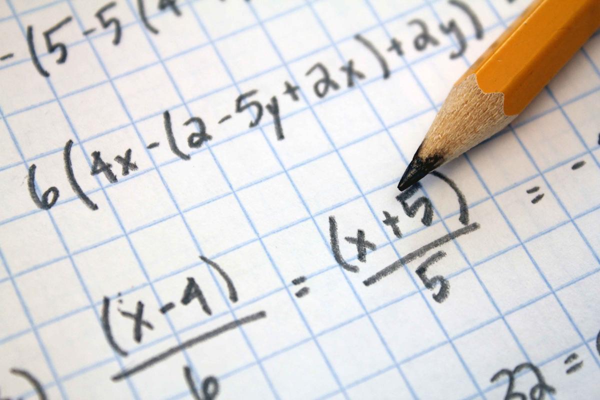 Illustration - Shutterstock | <a href="https://www.shutterstock.com/image-photo/math-problems-on-graph-paper-pencil-172115972">R. MACKAY PHOTOGRAPHY, LLC</a>