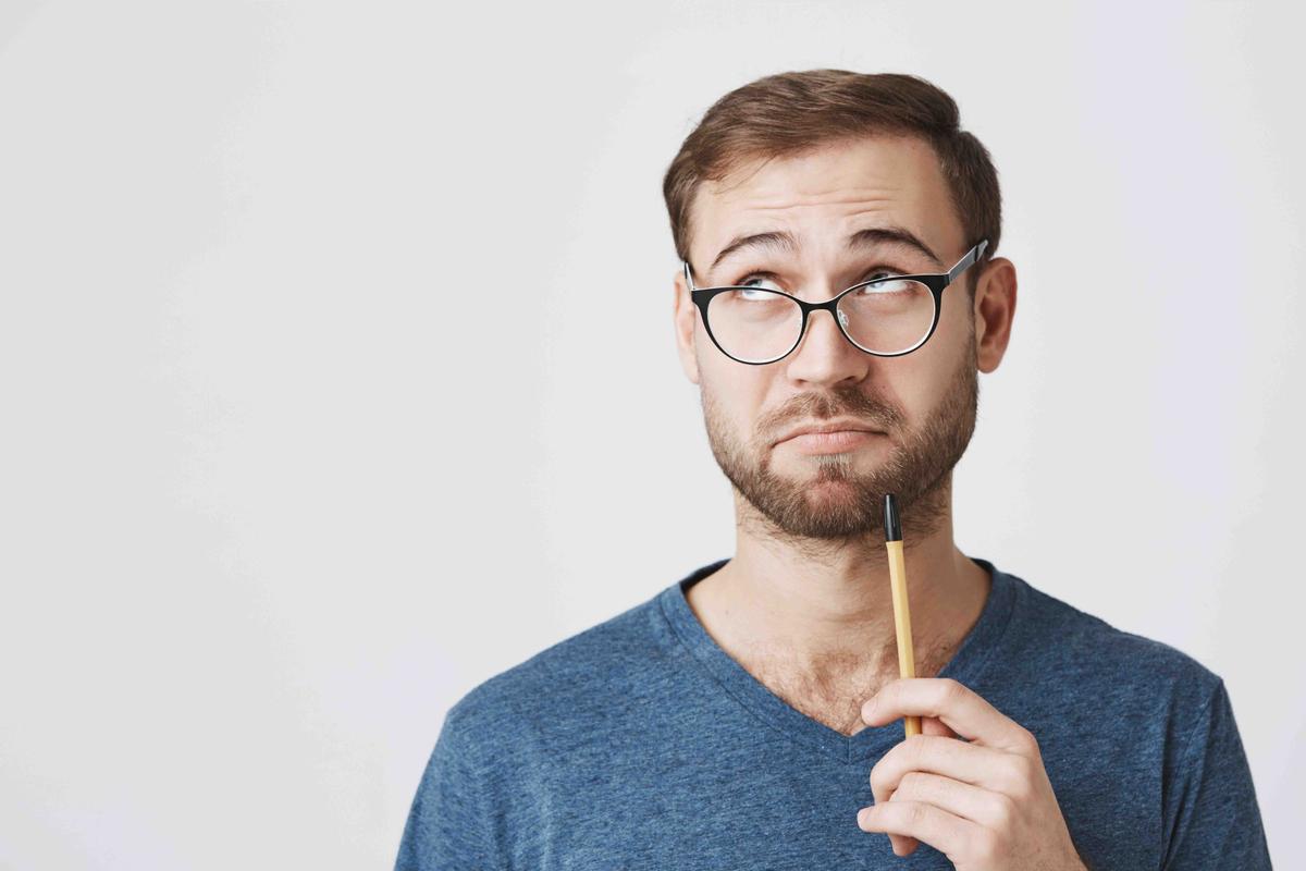 Illustration - Shutterstock | <a href="https://www.shutterstock.com/image-photo/pensive-professor-beard-spectacles-casual-clothes-794521453">Cookie Studio</a>