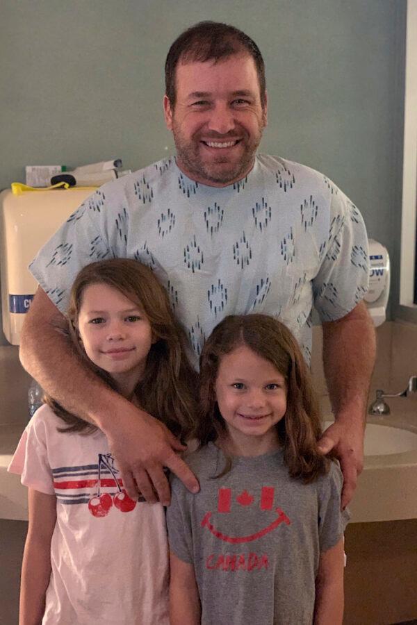 NASCAR driver Ryan Newman and his daughters, Brooklyn Sage, left, and Ashlyn Olivia, at Halifax Medical Center in Daytona Beach, Fla. (Roush Racing via AP)