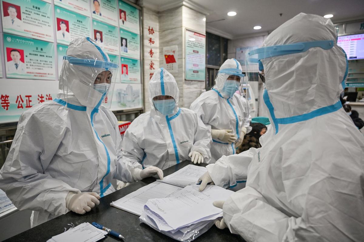 Medical staff members are working at the Wuhan Red Cross Hospital in Wuhan, China, on Jan. 25, 2020. (Hector Retamal/AFP via Getty Images)