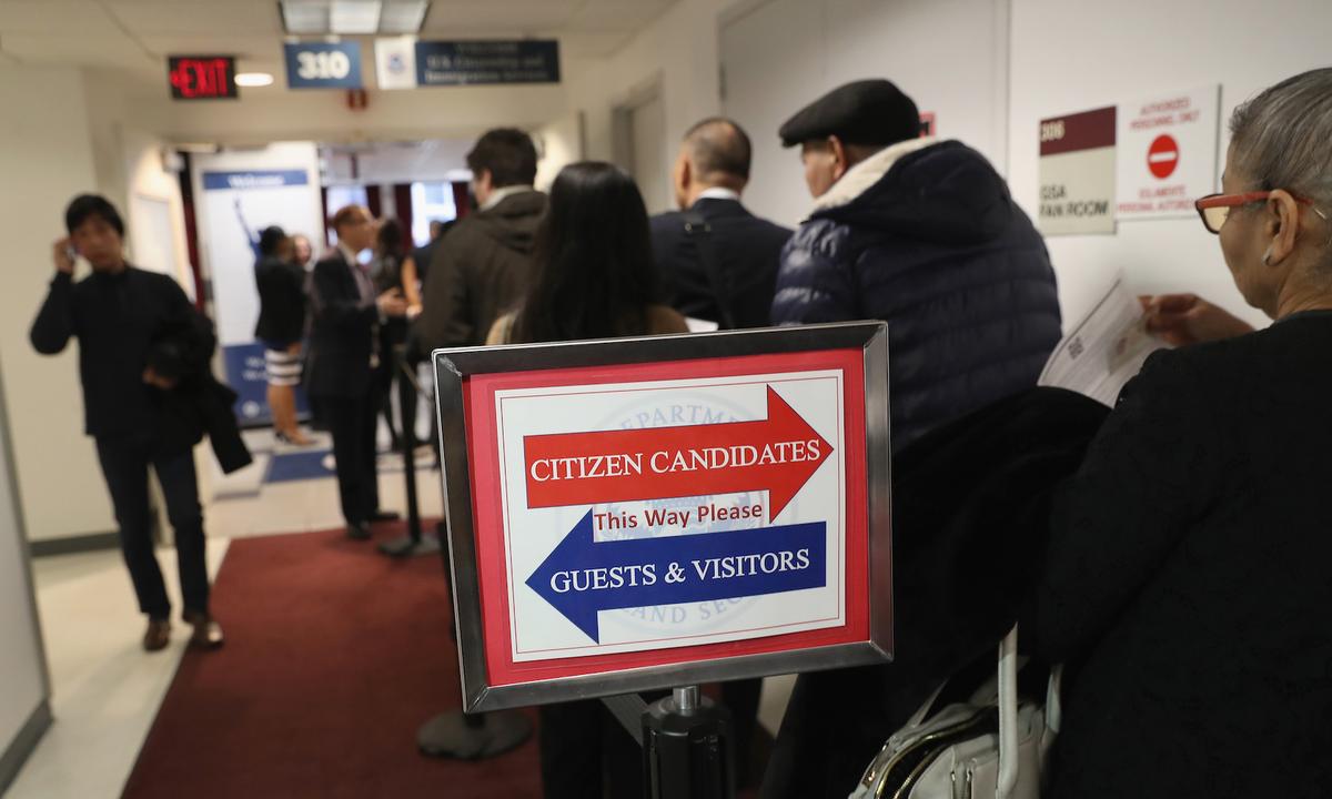 Immigrants wait in line to become U.S. citizens at a naturalization ceremony in New York City, N.Y., on Feb. 2, 2018. (John Moore/Getty Images)