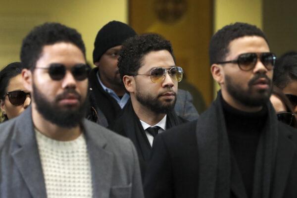 Actor Jussie Smollett (C) departs after an initial court appearance at the Leighton Criminal Courthouse, in Chicago, Ill., on Feb. 24, 2020. (Charles Rex Arbogast/AP Photo)