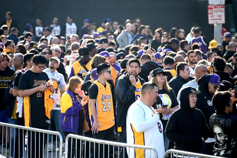 Fans line up outside to Staples Center waiting to enter to attend the memorial to celebrate the life of Kobe Bryant and daughter Gianna Bryant, in Los Angeles, on Feb. 24, 2019. (Jayne Kamin-Oncea-USA TODAY Sports via Reuters)