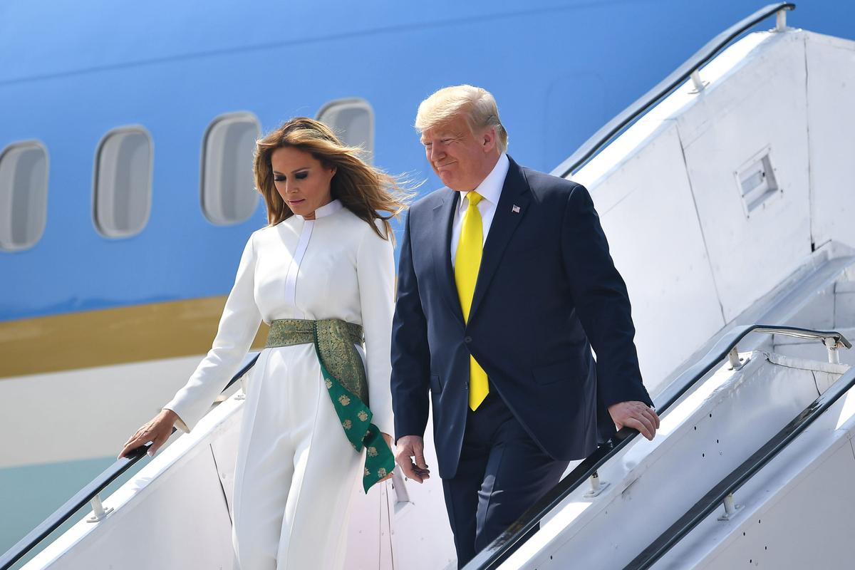 U.S. President Donald Trump and First Lady Melania Trump disembark from Air Force One at Sardar Vallabhbhai Patel International Airport in Ahmedabad on Feb. 24, 2020. (Mandel Ngan/AFP via Getty Images)