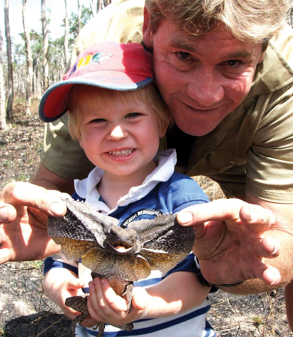 Steve Irwin poses with his son, Robert, at Australia Zoo Aug. 2, 2006, in Beerwah, Australia. (©Getty Images | <a href="https://www.gettyimages.ca/detail/news-photo/steve-irwin-poses-with-his-son-bob-at-australia-zoo-august-news-photo/77794221?adppopup=true">Australia Zoo</a>)