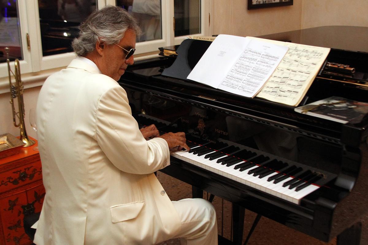 Bocelli performs at the White Party Dinner hosted by Andrea and Veronica Bocelli at the couple's home in Forte dei Marmi, Florence, Italy, on Sept. 5, 2014. (©Getty Images | <a href="https://www.gettyimages.com/detail/news-photo/andrea-bocelli-performs-at-the-white-party-dinner-hosted-by-news-photo/454726838?adppopup=true">Andrew Goodman</a>)