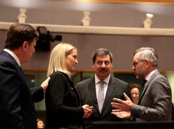 Irish Minister of State for European Affairs Helen McEntee, second (L), speaks with Slovakia's State Secretary of the Foreign Ministry Frantisek Ruzicka, second (R) and German Minister of State for European Affairs Michael Roth, (R) during a meeting of EU General Affairs ministers at the European Council building in Brussels, Belgium, on Feb. 25, 2020. (Virginia Mayo/AP Photo)