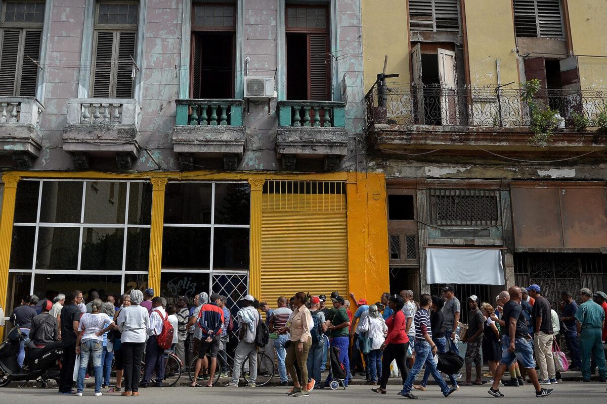 Cubans line up outside a bakery in Havana to buy bread on Dec. 13, 2018. (Yamil Lage/AFP via Getty Images)