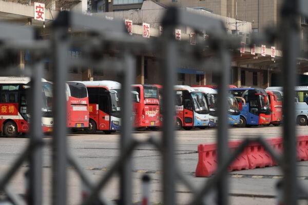 Buses are seen at a closed bus terminal in Wuhan, the epicenter of the Novel Coronavirus outbreak, Hubei province, China, on Feb. 24, 2020. (Stringer/Reuters)