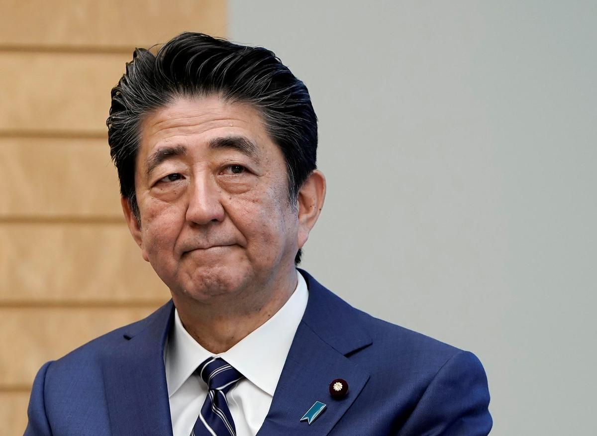 Japanese Prime Minister Shinzo Abe listens to IAEA Director General Rafael Grossi at the prime minister's official residence in Tokyo, Japan, on Feb. 25, 2020. (Kimimasa Mayama/Pool via Reuters)