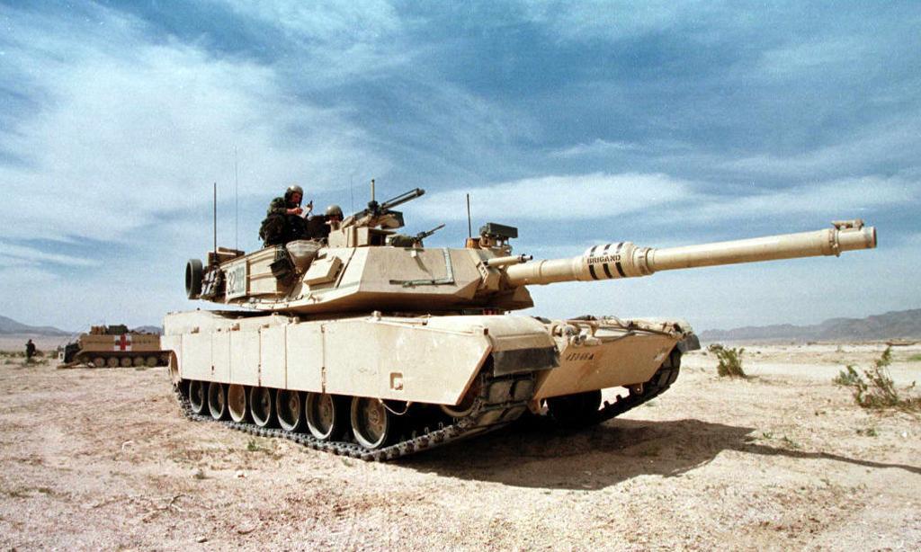 An M-1A1 Abrams tank guards a position during the Advance Warfighting Experiment at the Fort Irwin Army National Training Center in Fort Irwin, CA, March 16. (<a href="https://www.gettyimages.ca/detail/news-photo/an-m-1a1-abrams-tank-guards-a-position-during-the-advance-news-photo/51655625?adppopup=true">MIKE NELSON/AFP via Getty Images</a>)