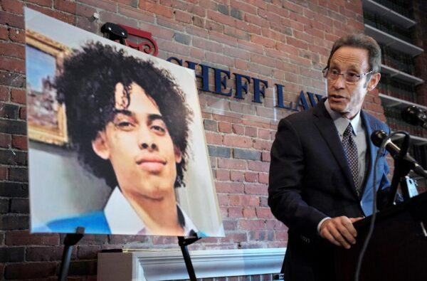 Doug Sheff (R), an attorney for the family of Leonel Rondon, pictured (L) speaks during a news conference, in Boston, on Oct. 25, 2018. (Steven Senne/AP Photo/File)