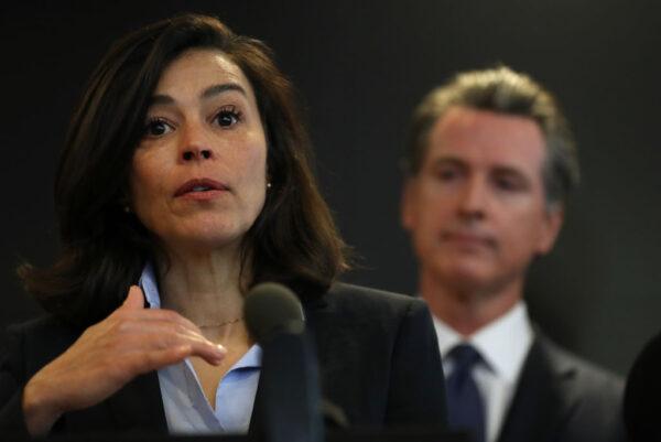 California Department of Public Health Director and State Health Officer Dr. Sonia Angell (L) speaks as California Gov. Gavin Newsom (R) looks on during a news conference at the California Department of Public Health in Sacramento, Calif., on Feb. 27, 2020. (Justin Sullivan/Getty Images)