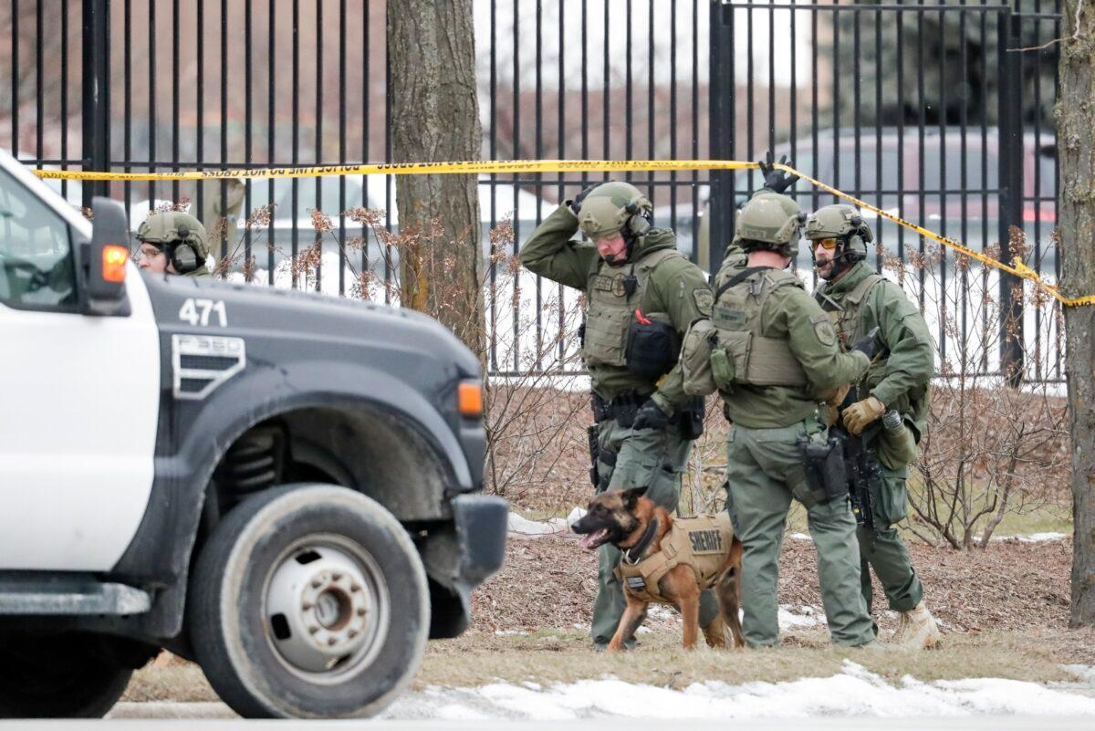 Police work outside the Molson Coors Brewing Co. campus in Milwaukee on Feb. 26, 2020, after reports of a possible shooting. (Morry Gash/AP Photo)