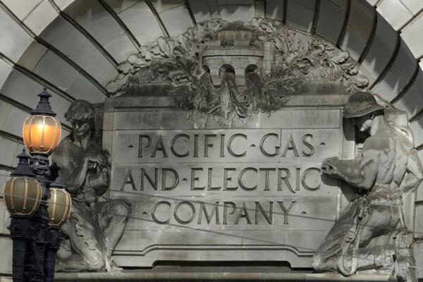 A Pacific Gas & Electric sign is shown outside of a PG&E building in San Francisco, Calif., on Oct. 10, 2019. (Jeff Chiu/File via AP)