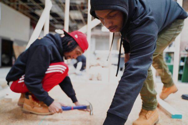 Young people learn construction skills at Chicago's Project H.O.O.D. on Feb. 17, 2020. (Cara Ding/The Epoch Times)
