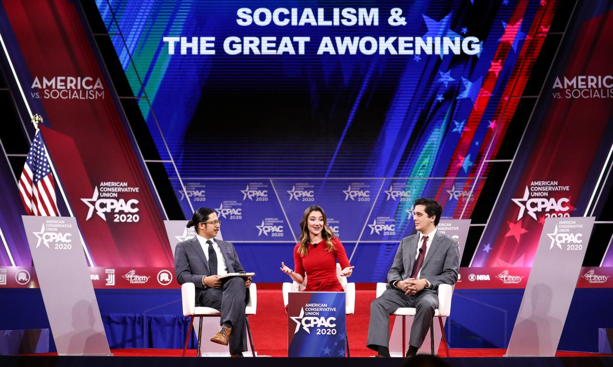 (L-R) Ian Walters, CPAC communications director, Morgan Zegers of Young Americans Against Socialism, and Joshua Philipp, senior reporter at The Epoch Times, speak at the CPAC convention in National Harbor, Md., on Feb. 28, 2020. (Samira Bouaou/The Epoch Times)