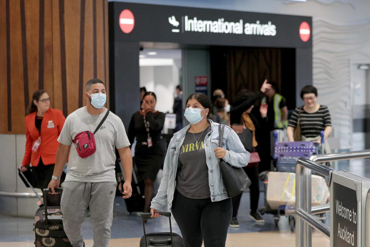 Passengers arriving on flights wear protective masks at the international airport in Auckland, New Zealand in a Jan. 29, 2020, file photograph. (Dave Rowland/Getty Images)