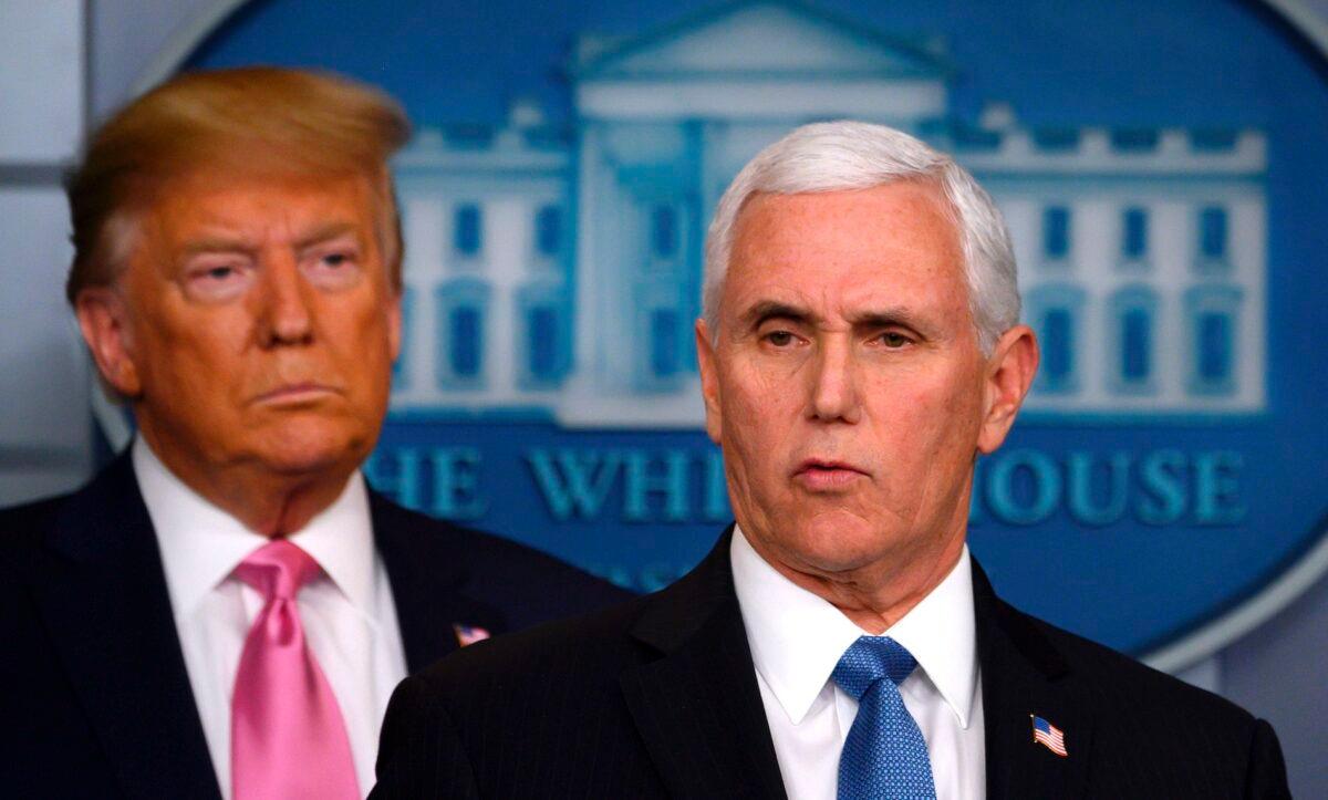 President Donald Trump looks on as Vice President Mike Pence speaks during a news conference on the COVID-19 outbreak at the White House on Feb. 26, 2020. (Andrew Caballero-Reynolds/AFP via Getty Images)