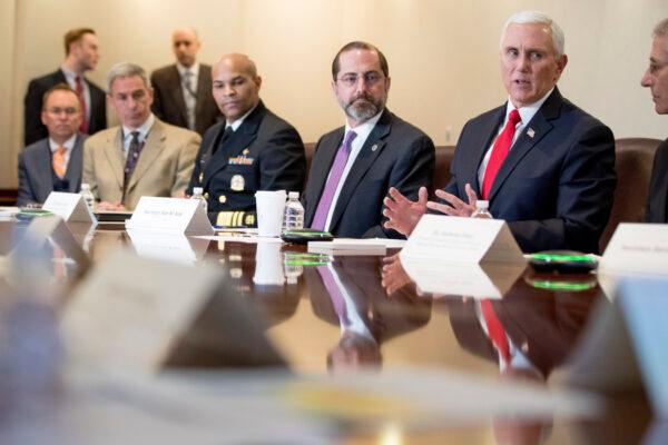 Vice President Mike Pence, accompanied by left, President Donald Trump's acting Chief of Staff Mick Mulvaney, acting Deputy Secretary of Homeland Security Ken Cuccinelli, Surgeon General Jerome Adams, Health and Human Services Secretary Alex Azar and National Institute for Allergy and Infectious Diseases Director Dr. Anthony Fauci, speaks at a coronavirus task force meeting at the Department of Health and Human Services, in Washington, on, Feb. 27, 2020. (AP Photo/Andrew Harnik)