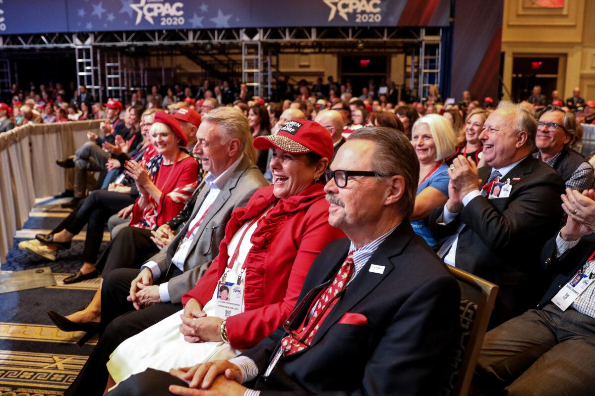 Audience members react as President Donald Trump speaks at the CPAC convention in National Harbor, Md., on Feb. 29, 2020. (Samira Bouaou/The Epoch Times)