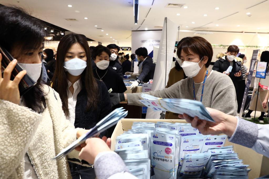 People buy face masks at a department store in Seoul, South Korea, on Feb. 28, 2020. (Chung Sung-Jun/Getty Images)