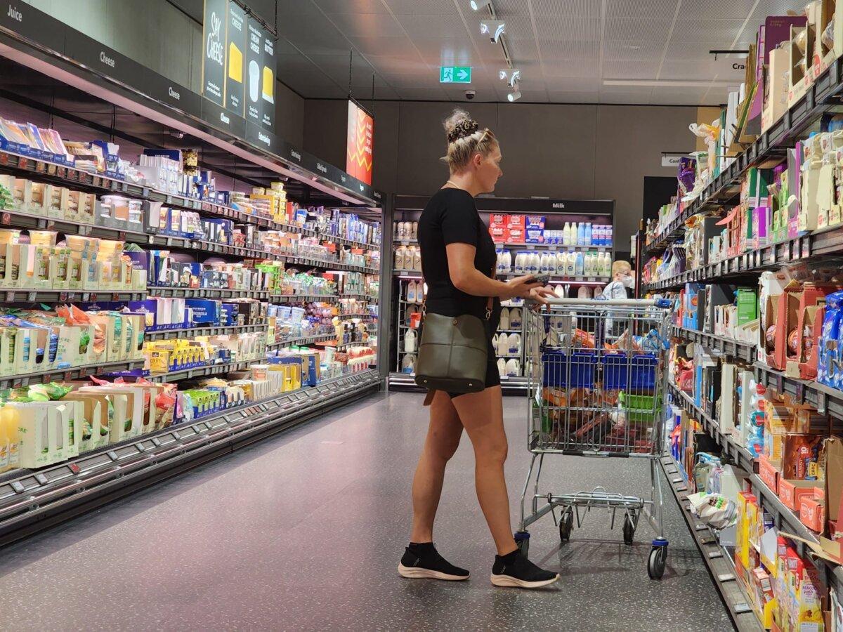 A woman shops in an Aldi supermarket in Albany, Western Australia, on Feb. 1, 2024. (Susan Mortimer/The Epoch Times)
