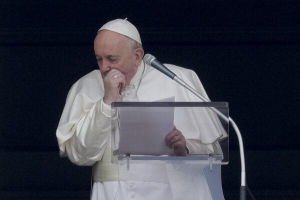Pope Francis coughs during the Angelus noon prayer he recited from the window of his studio overlooking St. Peter's Square, at the Vatican, on March 1, 2020. (Andrew Medichini/AP Photo)