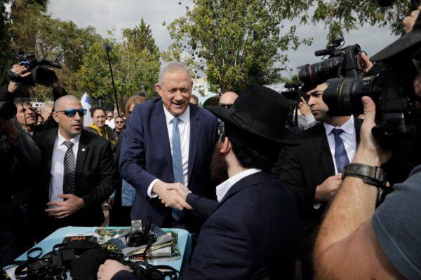 Blue and White party leader Benny Gantz meets public after casting a ballot in Rosh Haayin, Israel, on March 2, 2020. (Sebastian Scheiner/AP Photo)