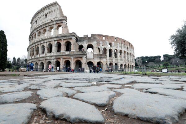 Very few people are seen in the area surrounding the Colosseum, which would usually be full of tourists, in Rome, Italy, on March 2, 2020. (Remo Casilli/Reuters)