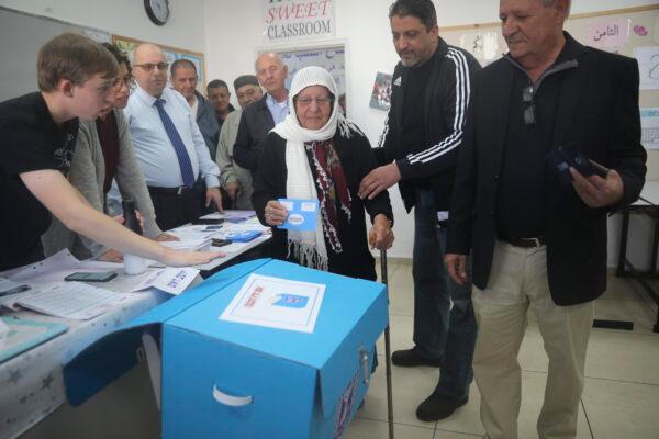 A woman casts her vote during elections in Haifa, Israel, on March 2, 2020. (Mahmoud Illean/AP Photo)