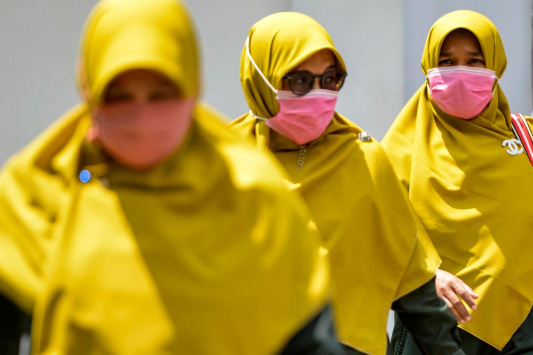Indonesia Confirms First Coronavirus Cases, a Mother and Daughter
