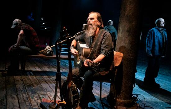 Steve Earle (foreground) wrote and performed the original music. (Joan Marcus)
