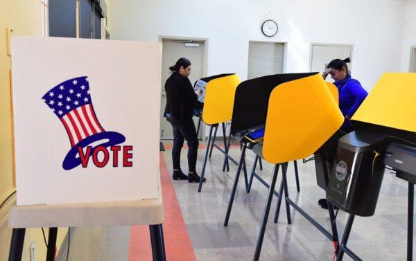 People cast their ballot at the South Whittier Community Resource Center in Whittier, Calif., for the presidential primary on Super Tuesday, March 3, 2020. (Frederic J. Brown/AFP via Getty Images)
