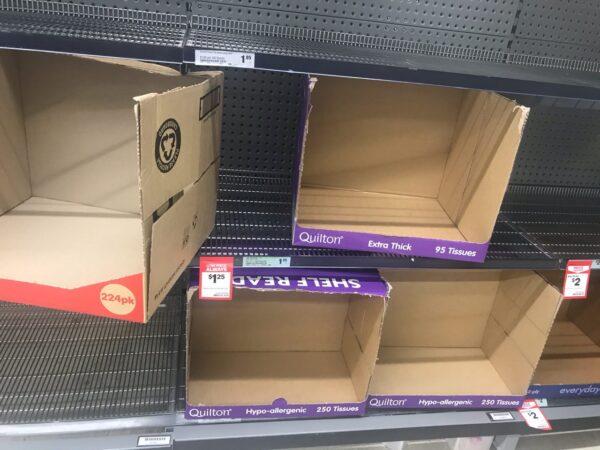 Shelves emptied by shoppers in a Sydney supermarket in Australia in a file photo. (Marina Dalila/The Epoch Times)