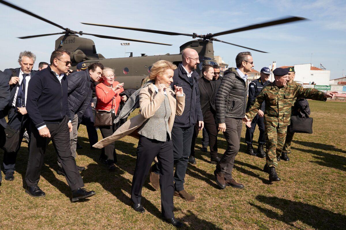 Greek Prime Minister Kyriakos Mitsotakis, European Commission President Ursula von der Leyen, European Council President Charles Michel and European Parliament President David-Maria Sassoli (not pictured) disembark a Chinook helicopter after flying over the Greek-Turkish border, in the region of Evros, Greece on March 3, 2020. (Greek Prime Minister's Office/Dimitris Papamitsos/Handout via Reuters)
