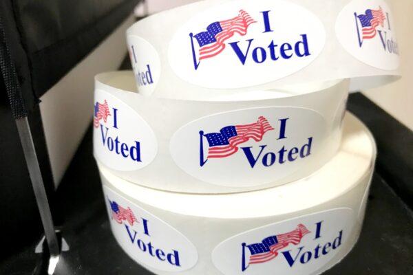 A roll of voter stickers at Santa Ana Downtown Plaza voting center on March 3, 2020. (Chris Karr/The Epoch Times)