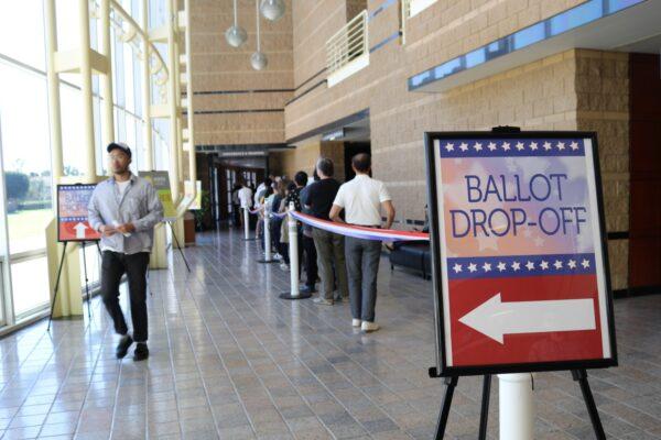 Voters line up at the Irvine City Hall voting center in Irvine, Orange County, on March 3, 2020. (Jamie Joseph/The Epoch Times)