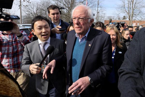Democratic 2020 U.S. presidential candidate Senator Bernie Sanders departs after he and his wife Jane O'Meara Sanders voted in the Vermont primary at their polling place in Burlington, Vermont, on March 3, 2020. (Jonathan Ernst/Reuters)