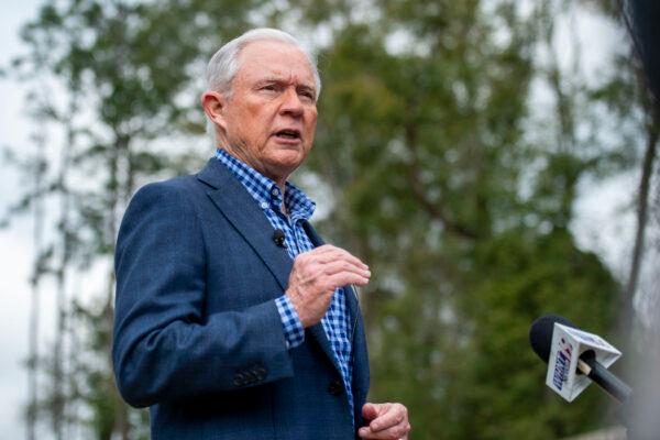 Jeff Sessions talks with the media after voting in Alabama’s state primary, Tuesday, March 3, 2020, in Mobile, Ala. (AP Photo/Vasha Hunt)
