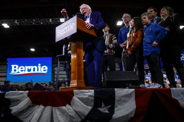 Democratic presidential candidate Sen. Bernie Sanders, I-Vt., accompanied by his wife Jane O’Meara Sanders and other family members, speaks during a primary night election rally in Essex Junction, Vt., on March 3, 2020. (AP Photo/Matt Rourke)