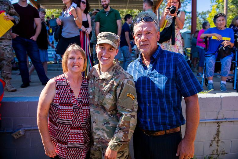 Hibsch and her parents at graduation at Fort Benning's Victory Pond in Georgia on Aug. 30, 2019 (Courtesy of <a href="https://www.dvidshub.net/image/5713961/airborne-and-ranger-training-brigade-graduation-clas-08-19">Patrick Albright, Maneuver Center of Excellence, Fort Benning Public Affairs/U.S. Army</a>)
