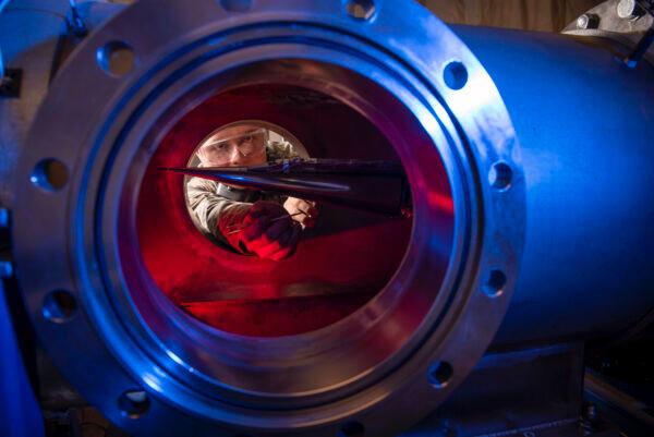A technician measures the pressures, temperatures, and flow field of hypersonic research vehicles at Mach 6 in The United States Air Force Academy's Department of Aeronautics on Jan. 31, 2019. (U.S. Air Force photo/Joshua Armstrong)