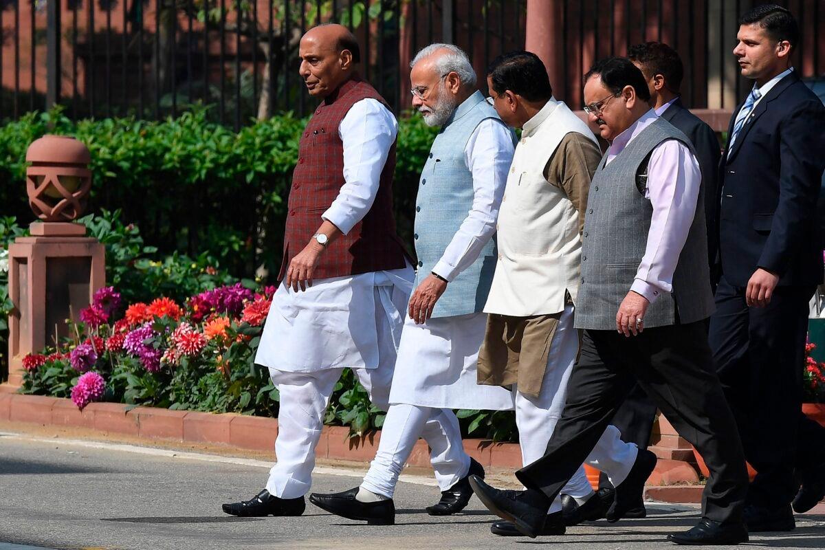 India's Prime Minister Narendra Modi, second from left, and other officials after a meeting at the Parliament House in New Delhi on March 3, 2020. (Prakash Singh/AFP via Getty Images)