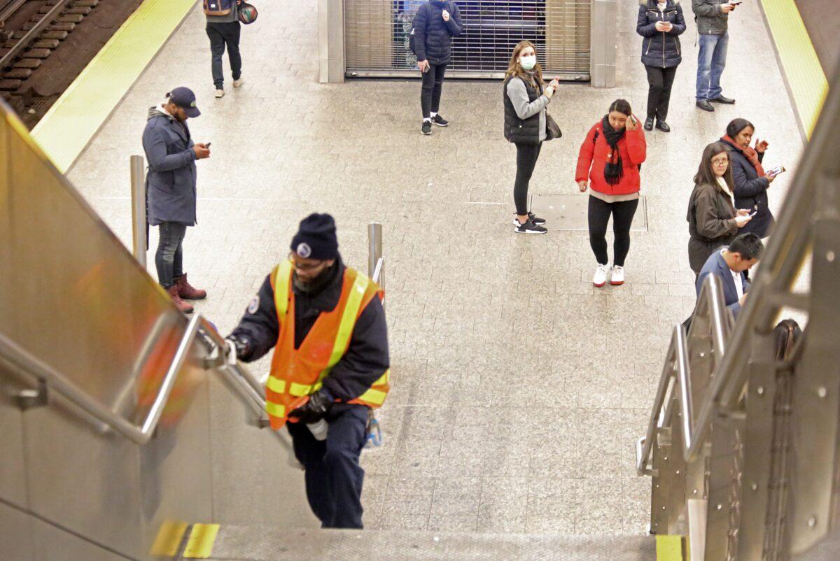 MTA cleaning staff disinfect the 86th St. Q train station in New York City on March 4, 2020. (Yana Paskova/Getty Images)