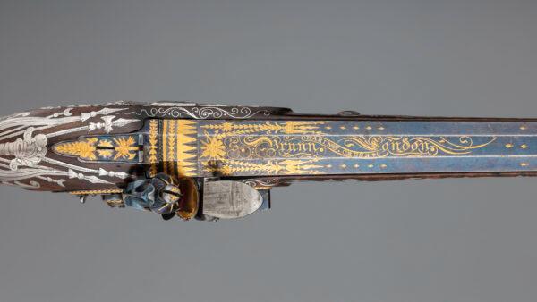 Detail of the flintlock pistol's blued steel barrel with gold inlay, 1800–1801, by gunmaker Samuel Brunn and silversmith Michael Barnett. Purchased through the Harris Brisbane Dick Fund and gift of George D. Pratt, by exchange, 1992. (The Metropolitan Museum of Art)