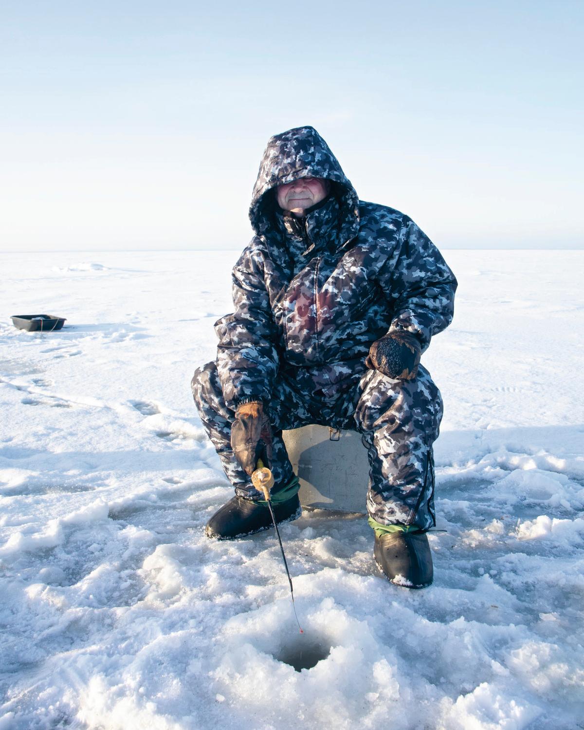 The icy Arctic waters hold a bounty of fresh seafood for the fishing. (Stefan Wettainen)