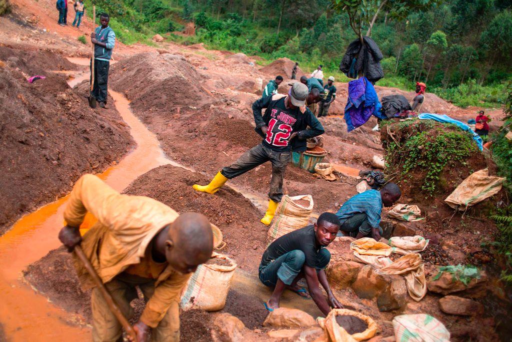 People work at the Kalimbi cassiterite artisanal mining site north of Bukavu, Congo, on March 30, 2017. (Griff Tapper/AFP via Getty Images)